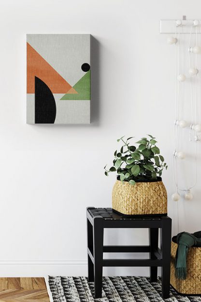 Abstract Triangles and dark circle canvas in interior