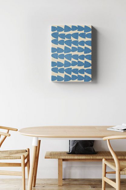 Blue rounded arrow shape canvas in interior