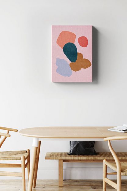 Shade of pink and blue shapes canvas in interior