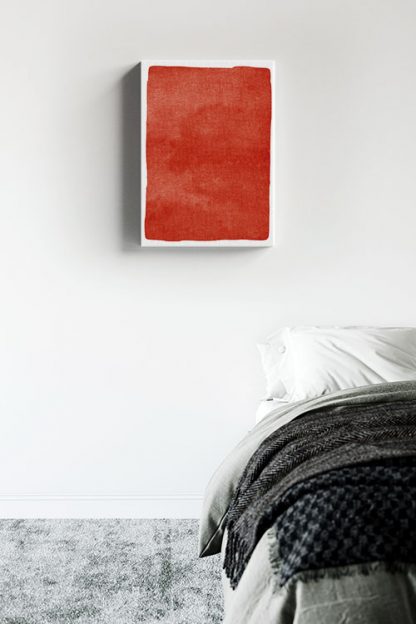 Textured red watercolor canvas in interior