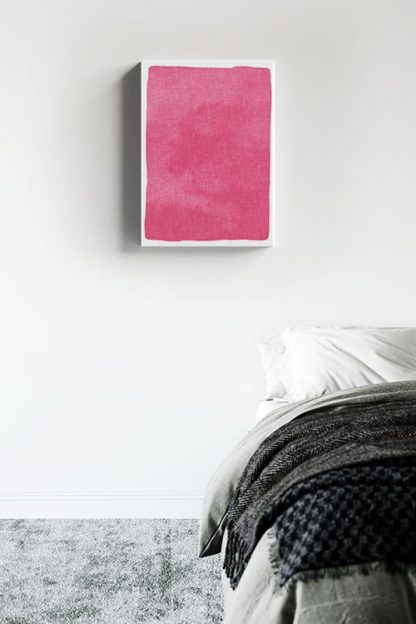 Textured pink watercolor canvas in interior