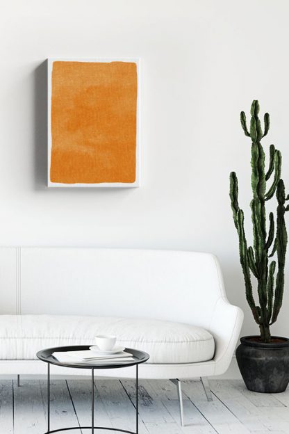 Textured orange watercolor canvas in interior