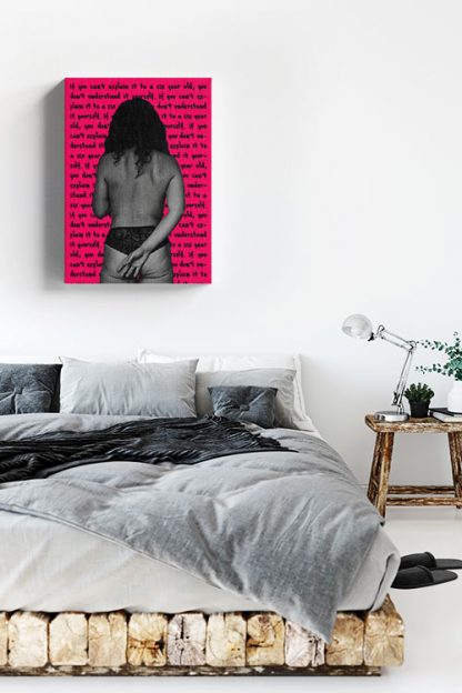 Women facing pink wall canvas