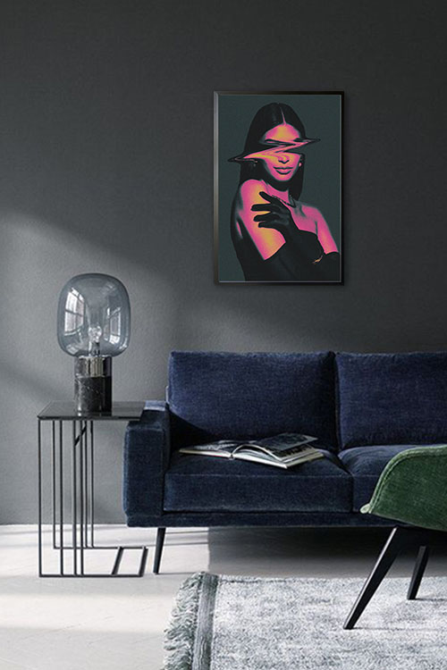 Yvonne Aresu on Glitch on poster with a black frame in a living room.