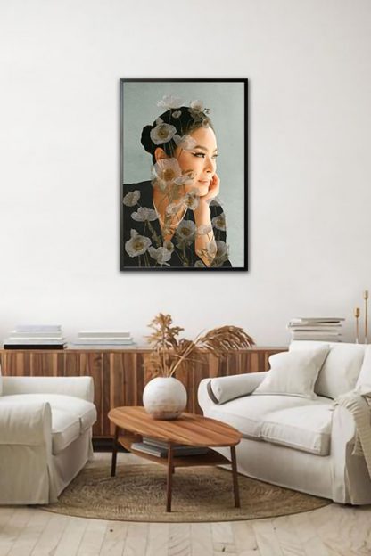 A framed poster of Maxine Medina with black frame in a minimalist living room.