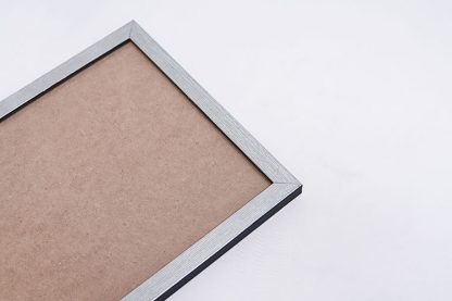 Silver frame with cardboard in a close up view