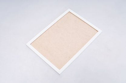 A white poster frame in a full view